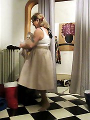 Her petticoat pressed her breasts forward