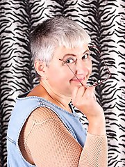 Hairy mature lady playing with herself