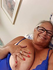 Slim older businesswomen are posing naked for money