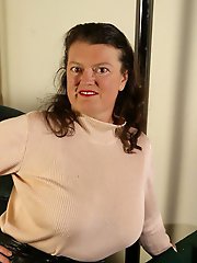 Cute tattooed babes are having a good time with a large penis