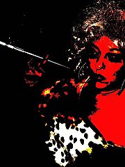 Mature female is posing outdoors